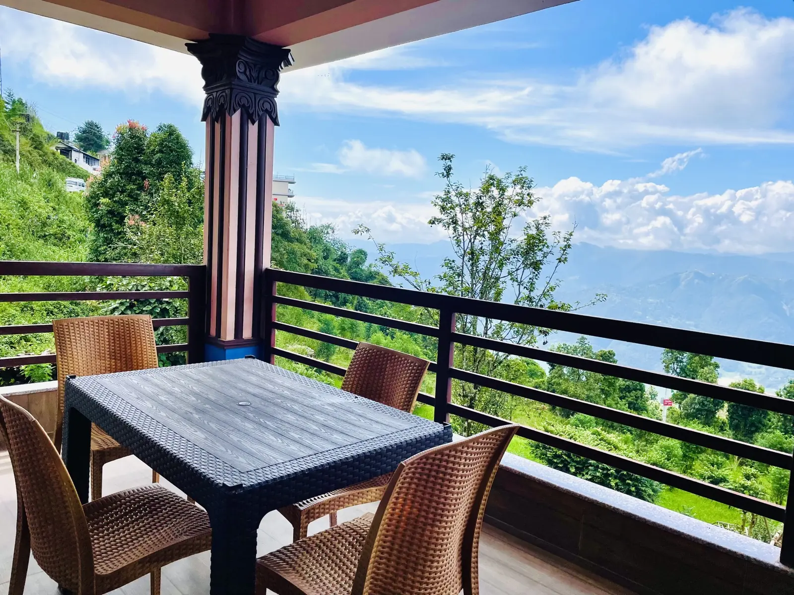Balcony dining with valley views